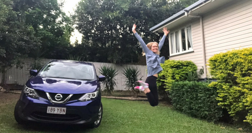 Happy new car owner from Brisbane Car Brokers with her brand new Nissan