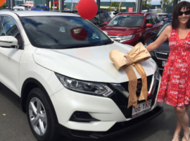 Brisbane Car Broker's customer Leanne, with her brand new Nissan